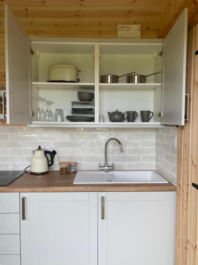 Shepherd's Huts In Barley Meadow At Spring Hill Farm *