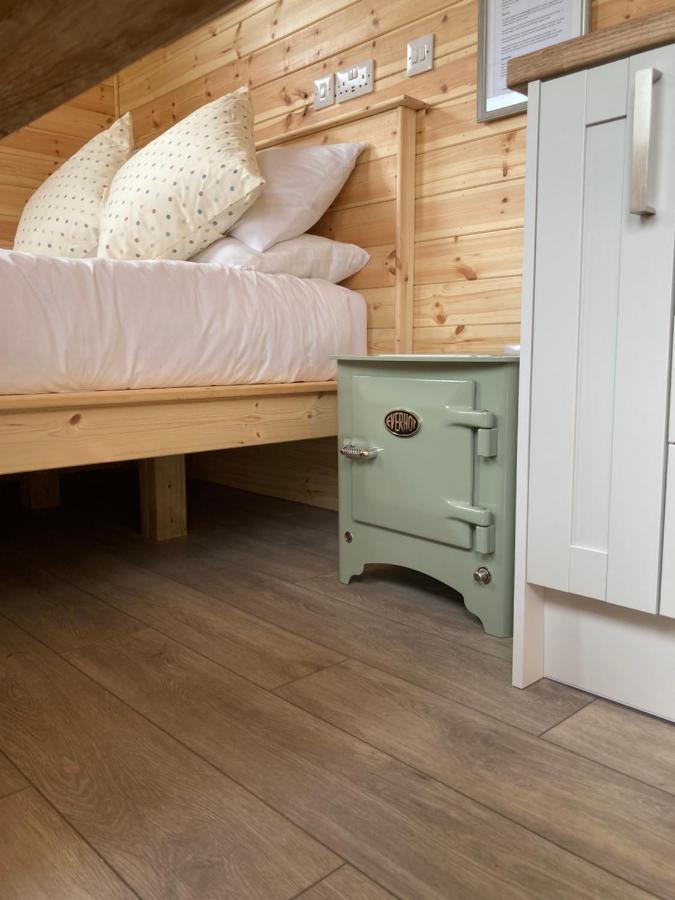 Shepherd's Huts In Barley Meadow At Spring Hill Farm
